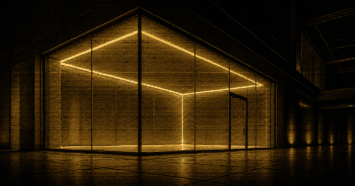 A large empty glass test chamber integrated into a dark, modern facility, with illuminated structural edges and a corridor extending into the surrounding building.