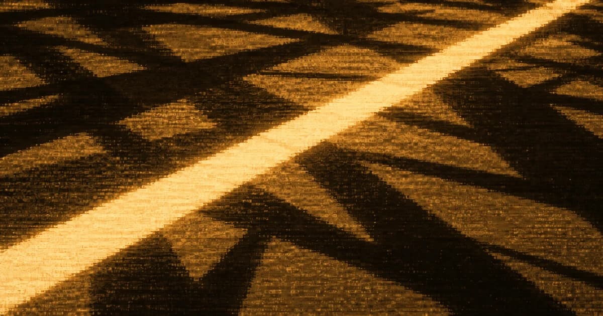 Dense angular shadows crossing the frame and a single narrow band of light cutting diagonally through them.